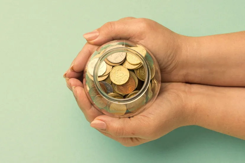 coins glass jar with copy space