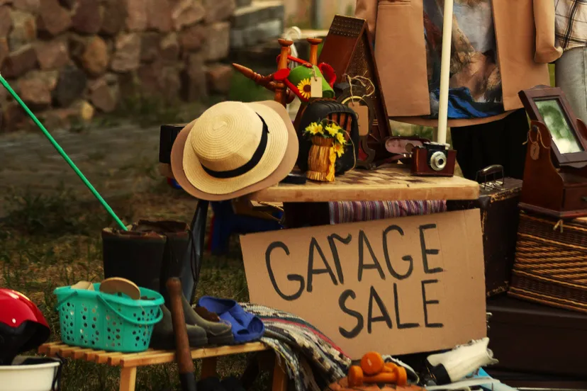 full-shot-woman-garage-sale