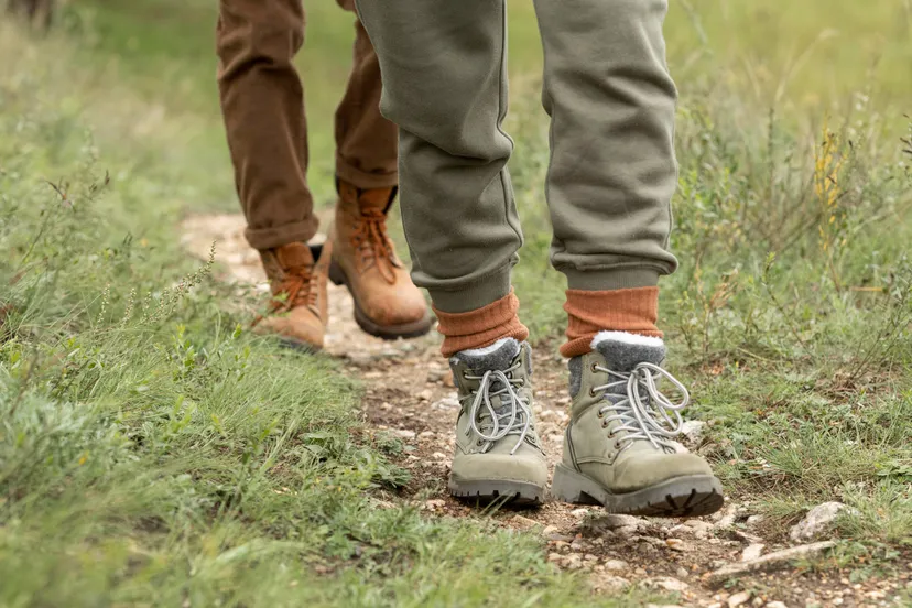 couple-s-feet-standing-trail