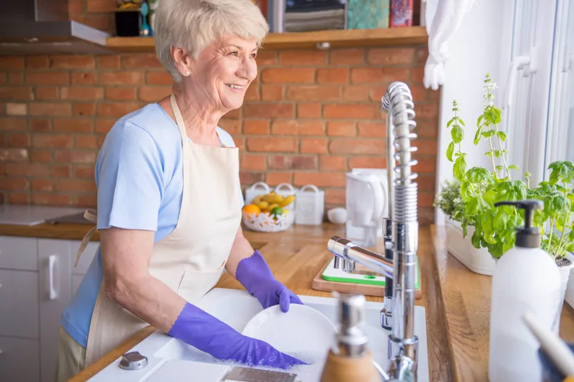 woman-washing-dishes-front-window