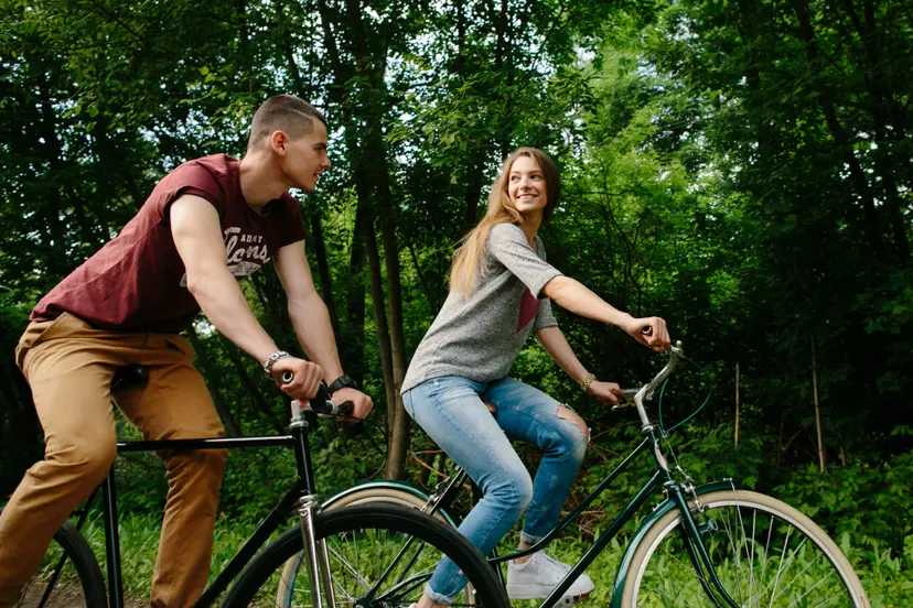 couple-bikes-young-happy-couple-cycling-outdoors