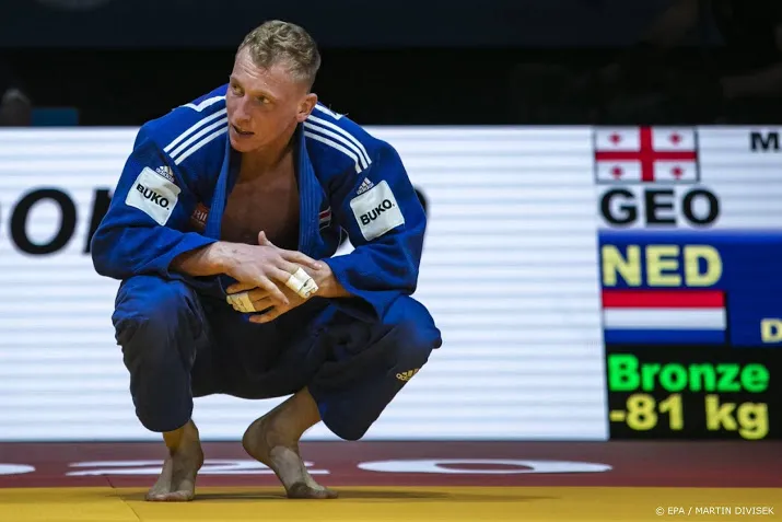 judoka de wit is nog niet bezig met spelen en wil eerste wk plak