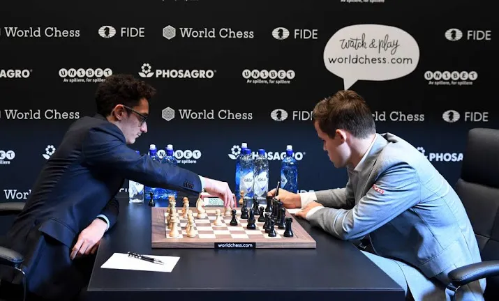 carlsen ontsnapt aan nederlaag in wk tweekamp