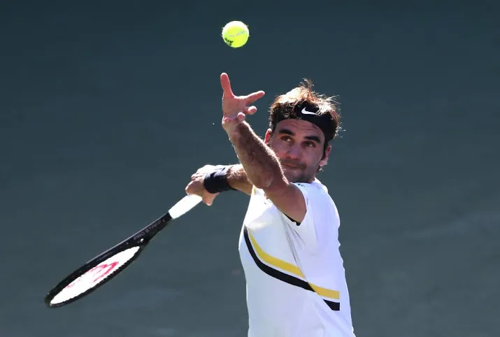 federer na regenonderbreking door