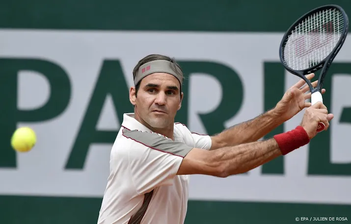 federer ondanks lastige derde set ronde verder