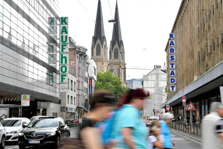 fusie kaufhof en karstadt kost 5000 banen
