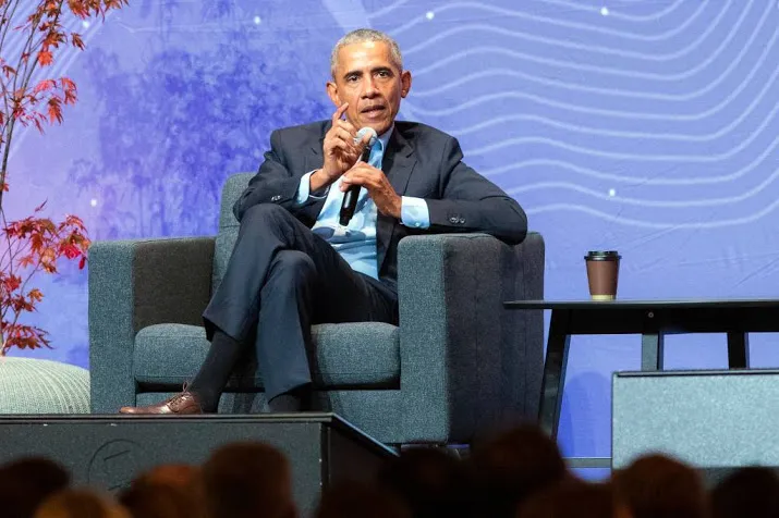 obama grapt over trump in amsterdam