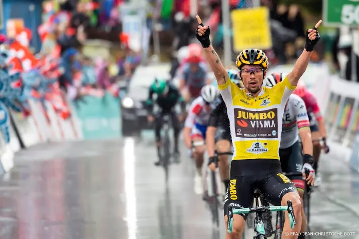 roglic wint natte koninginnenrit romandie