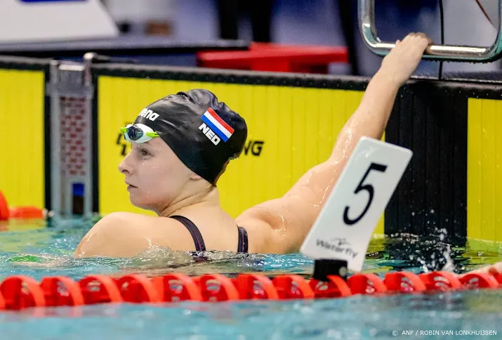 schouten zwemt in nederlands record naar spelen op 100 school