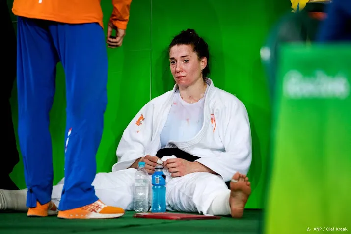 steenhuis en verkerk op wk judo naast podium
