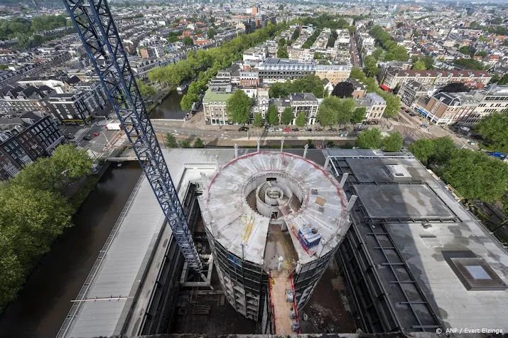 verbouwing hoofdkantoor dnb duurt langer door asbestverwijdering