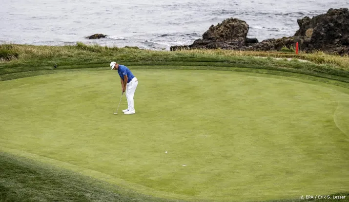 woodland behoudt nipte voorsprong op us open