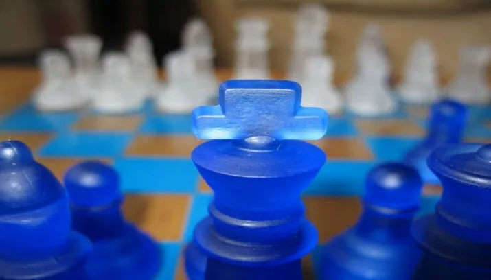 blue chess king game board
