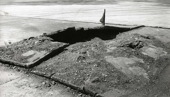 buurtfilosoof gat in de weg