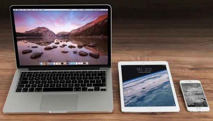 laptop digital tablet and mobile phone on wooden table 1