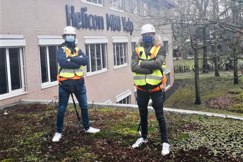 studenten op het dak