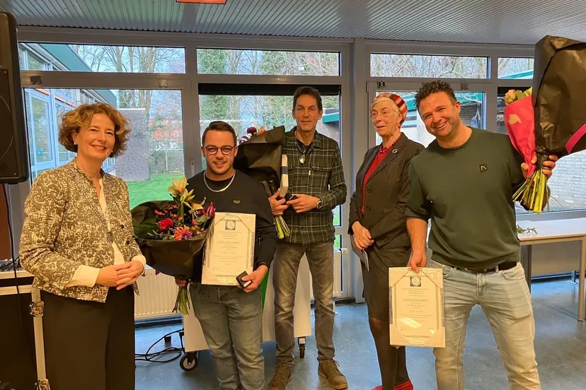 uitreiking zilveren medaille