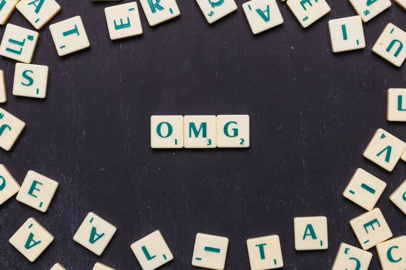 omg text made from scrabble game letters