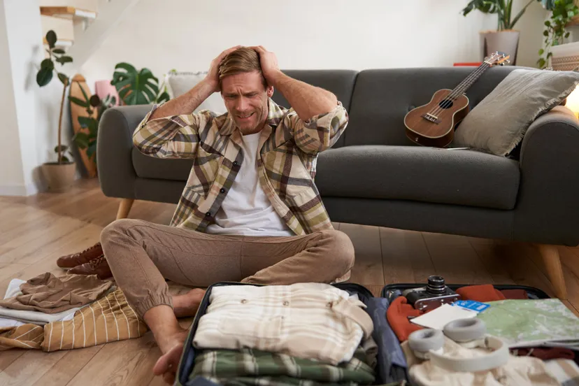 portrait-guy-panic-packs-suitcase-looks-stressed-worried-clueless-what-bring-holiday