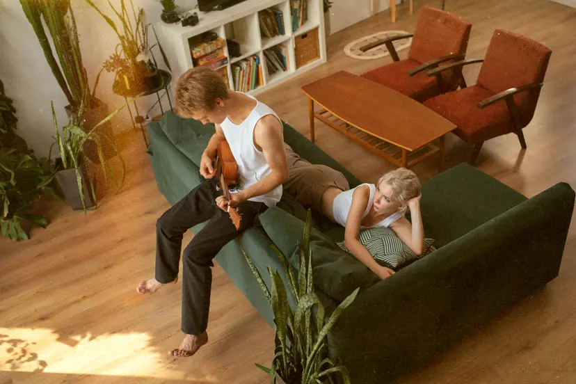 high-angle-man-playing-ukulele