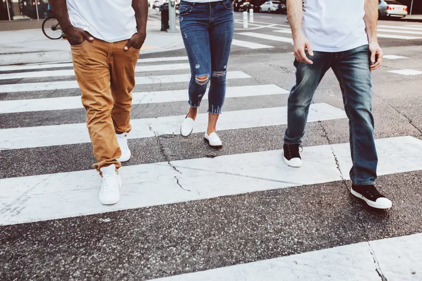 streetwear-apparel-jeans-men-women-crossing-road-city