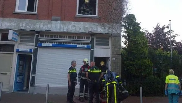 150623 woningbrand hoogstraat wijkagent welling e1434928969483