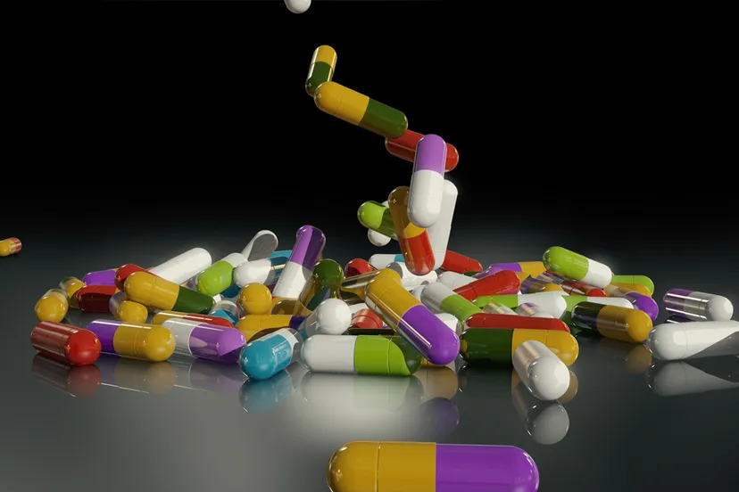3d rendering veelkleurige medische pillen vallen van boven naar beneden