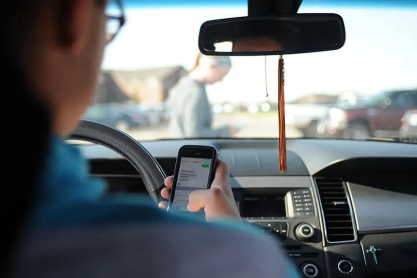 appen achter het stuur