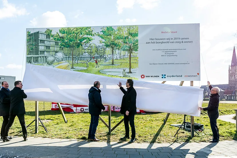 onthulling bouwbord wozoco