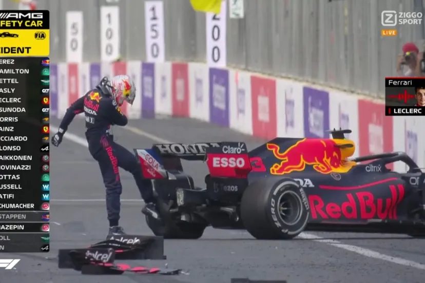 verstappen trapt gefrustreerd tegen geplofte linkerachterband