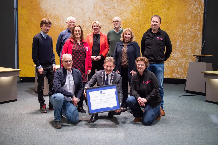 overhandiging unesco oorkonde 50