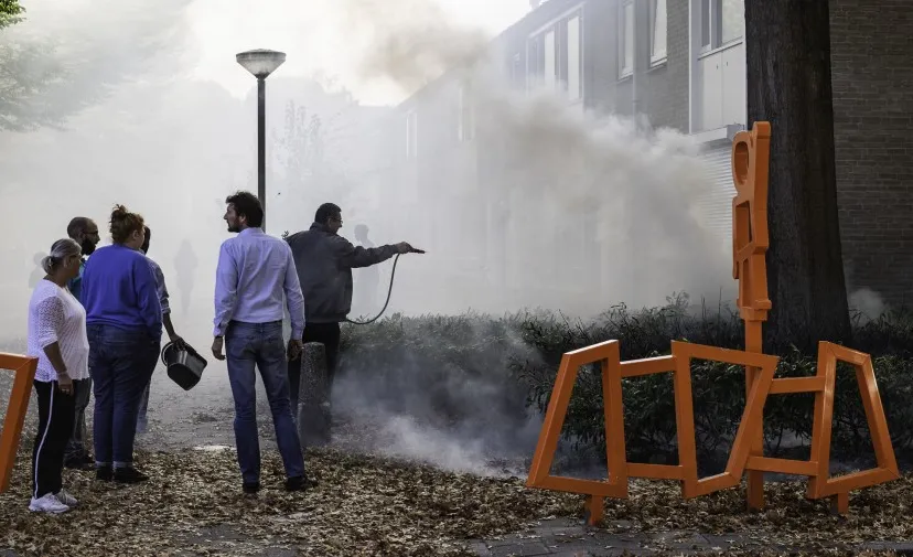 buitenbrand geblust door buren