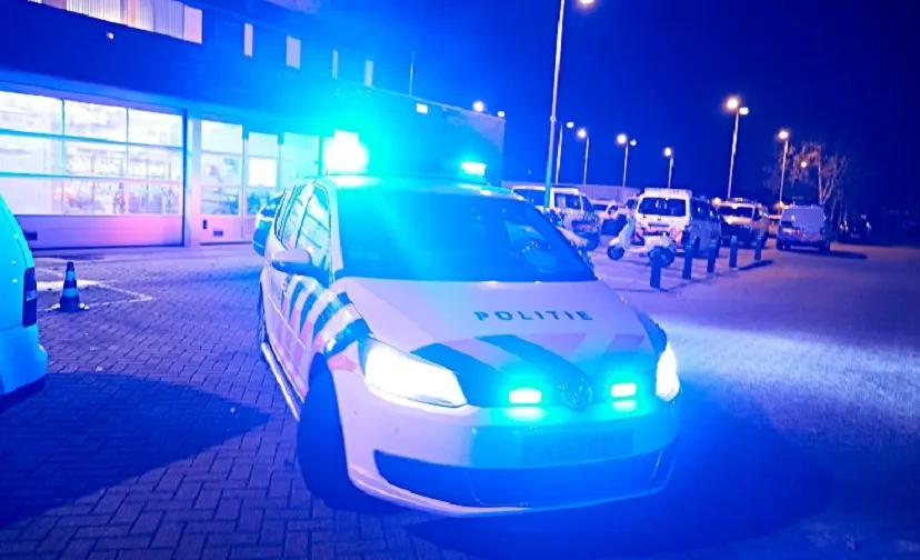politieauto met zwaailicht