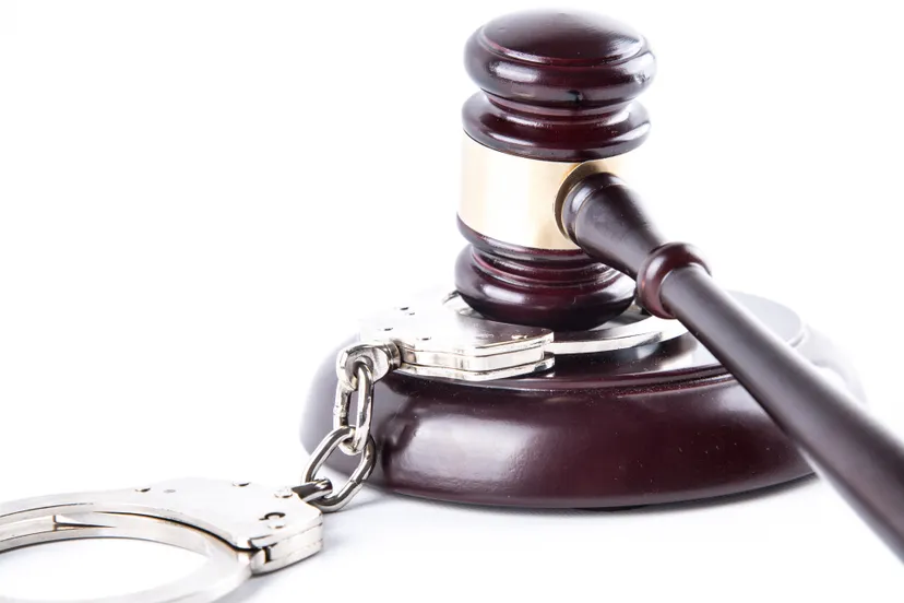 judge gavel and handcuffs 14612908610bq