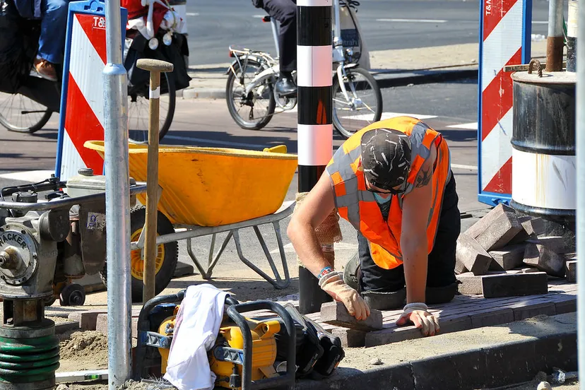 werkende mannen stratenmaker