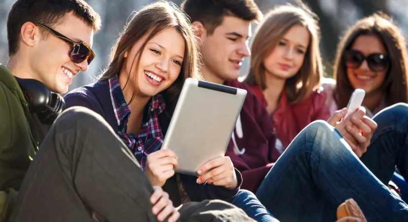 young people using smartphones and tablets1 900x450