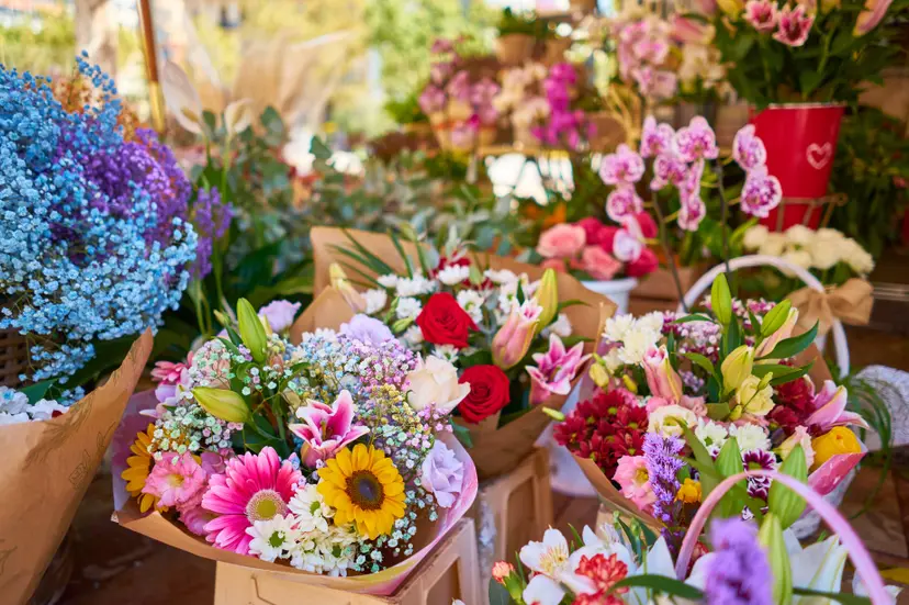 closeup-colorful-flower-bouquets-containers-outdoor-shop