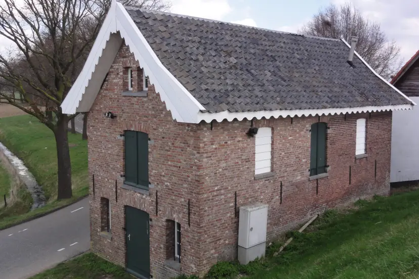 Wijchen_Ravensteinseweg_521_dijkmagazijn_(poldermagazijn)_Gem.Mon._(02)