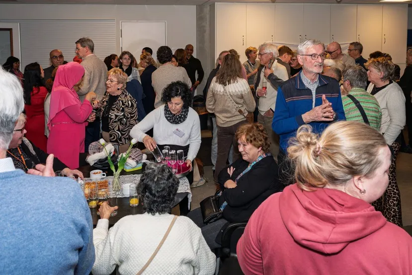 Goede sfeer op nieuwjaarsreceptie Stichting Piëzo - fotograaf Hans Heemskerk