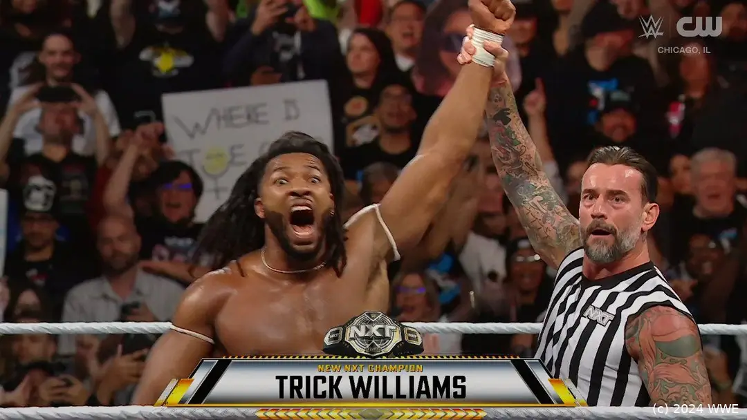 CM Punk präsentiert den nunmehr zweifachen NXT-Champion Trick Williams