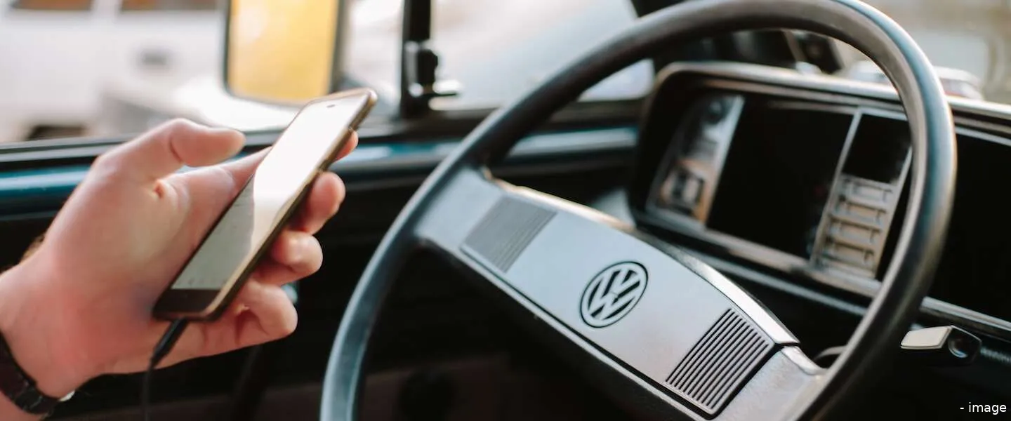 appen achter stuur boete