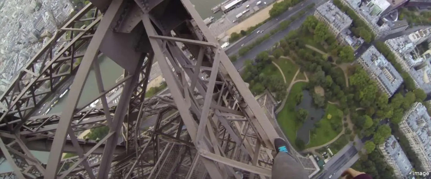climbing the eiffel tower