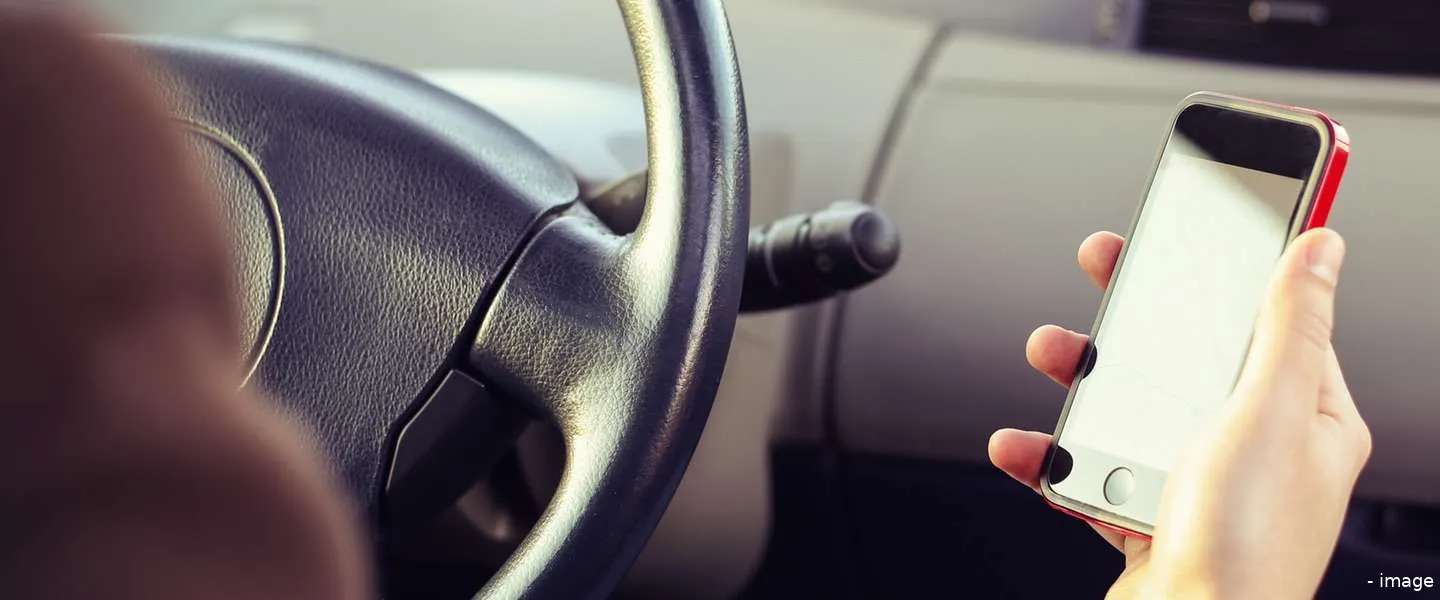 flitscamera appen achter stuur