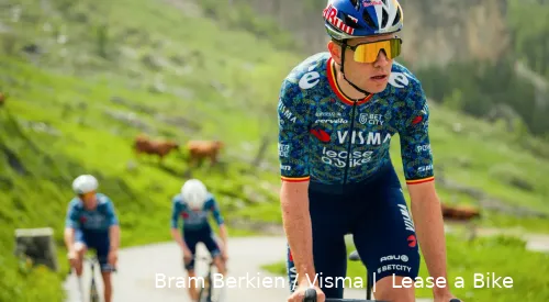 Wout van Aert donning the Tour jersey of Visma | Lease a Bike<br>