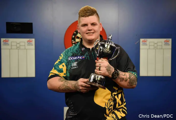Corey Cadby holds runners-up trophy.