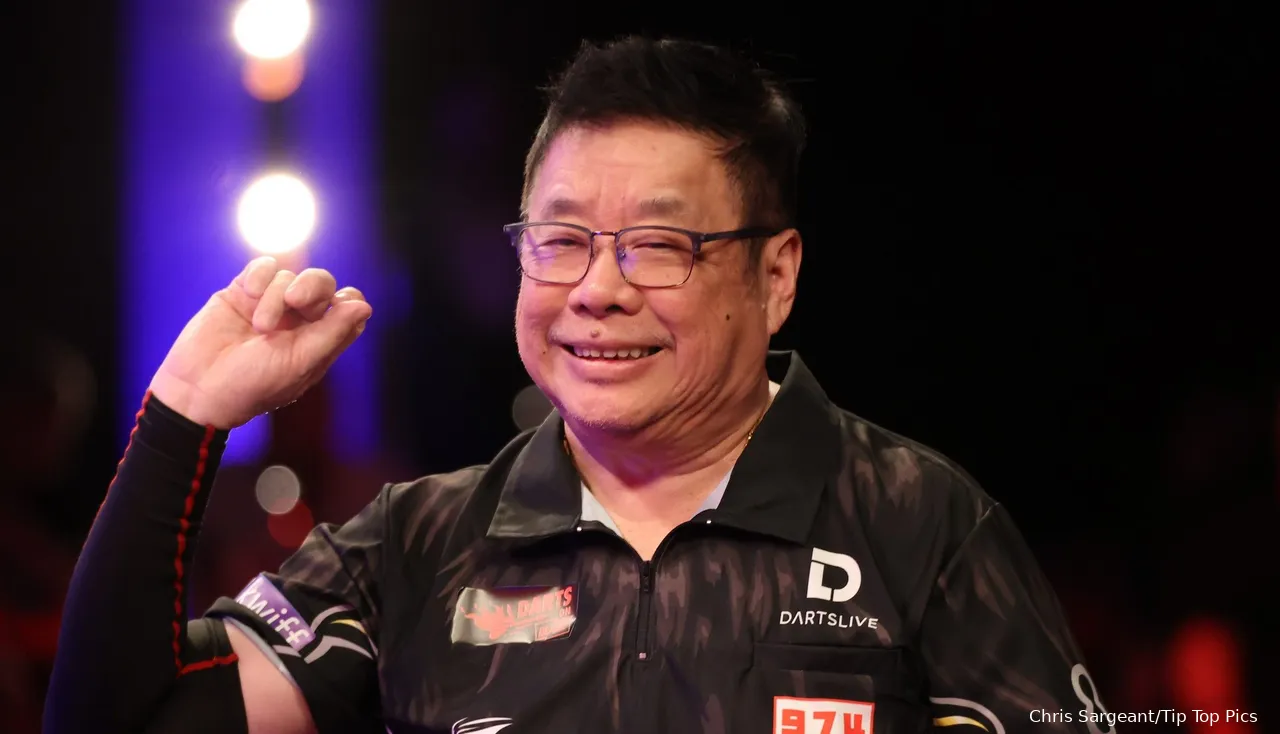 Paul Lim on stage at Lakeside Country Club