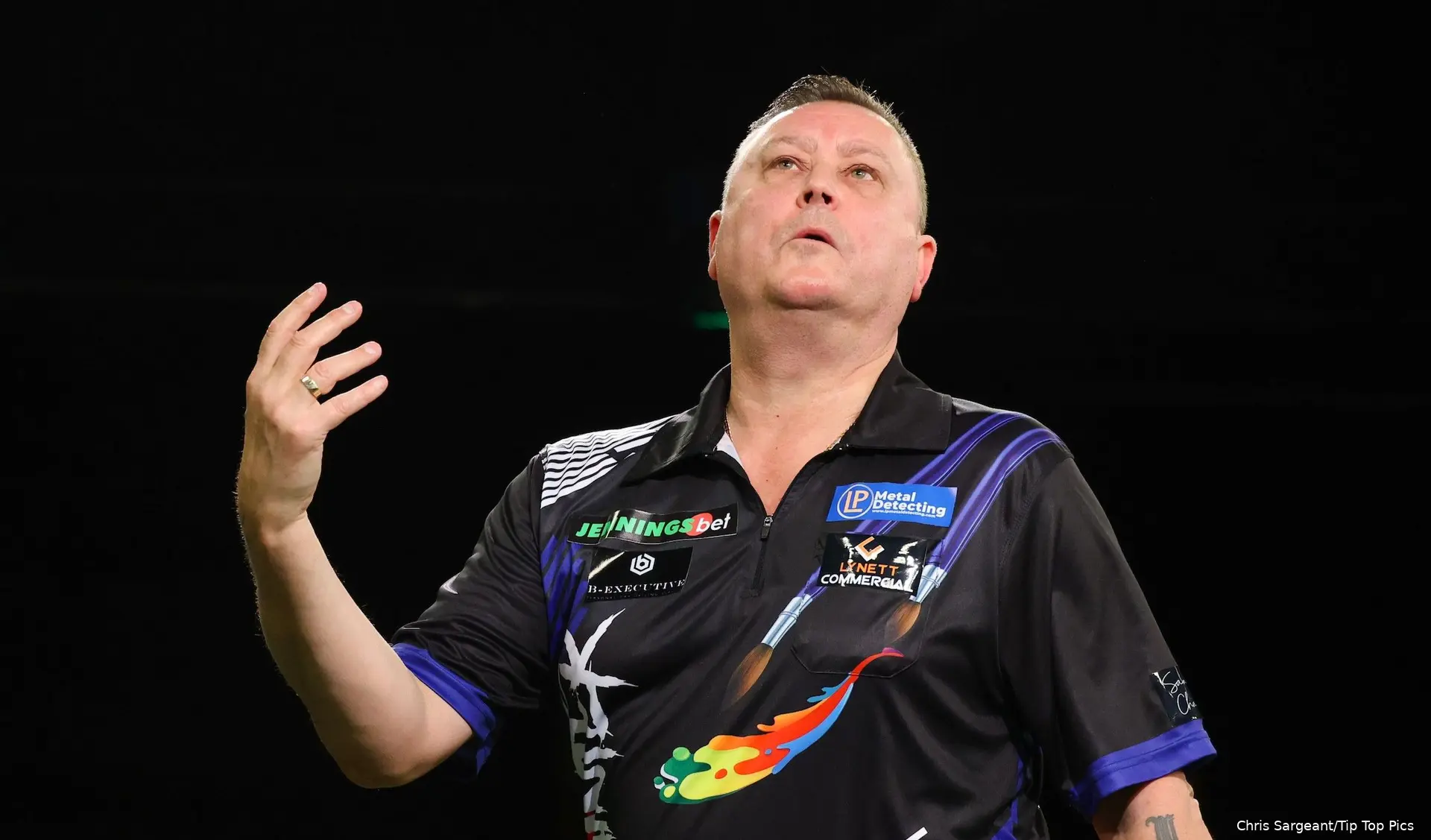 Kevin Painter throwing his arm in the air
