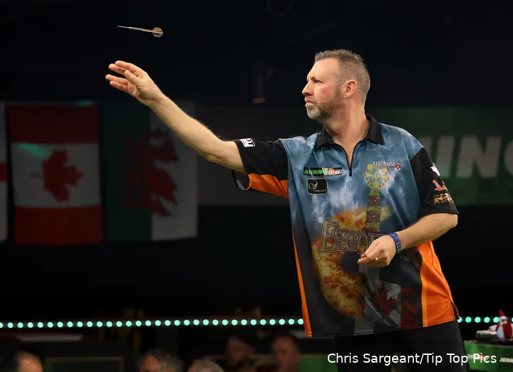 Cameron in action at the World Seniors Darts Championship&nbsp;