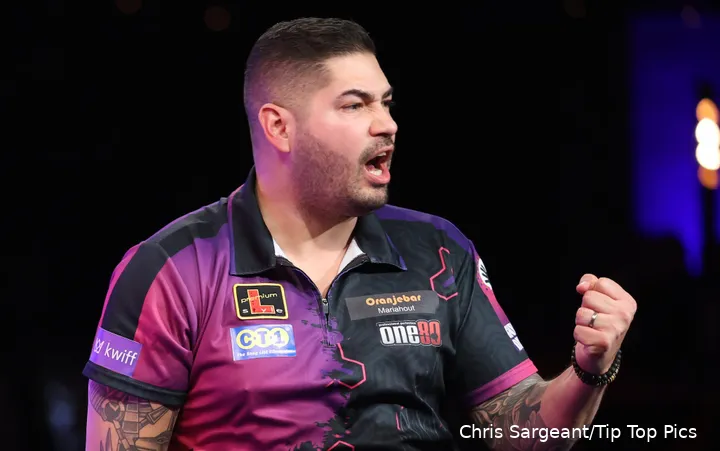 Jelle Klaasen pumps his fist and celebrates toward the crowd.