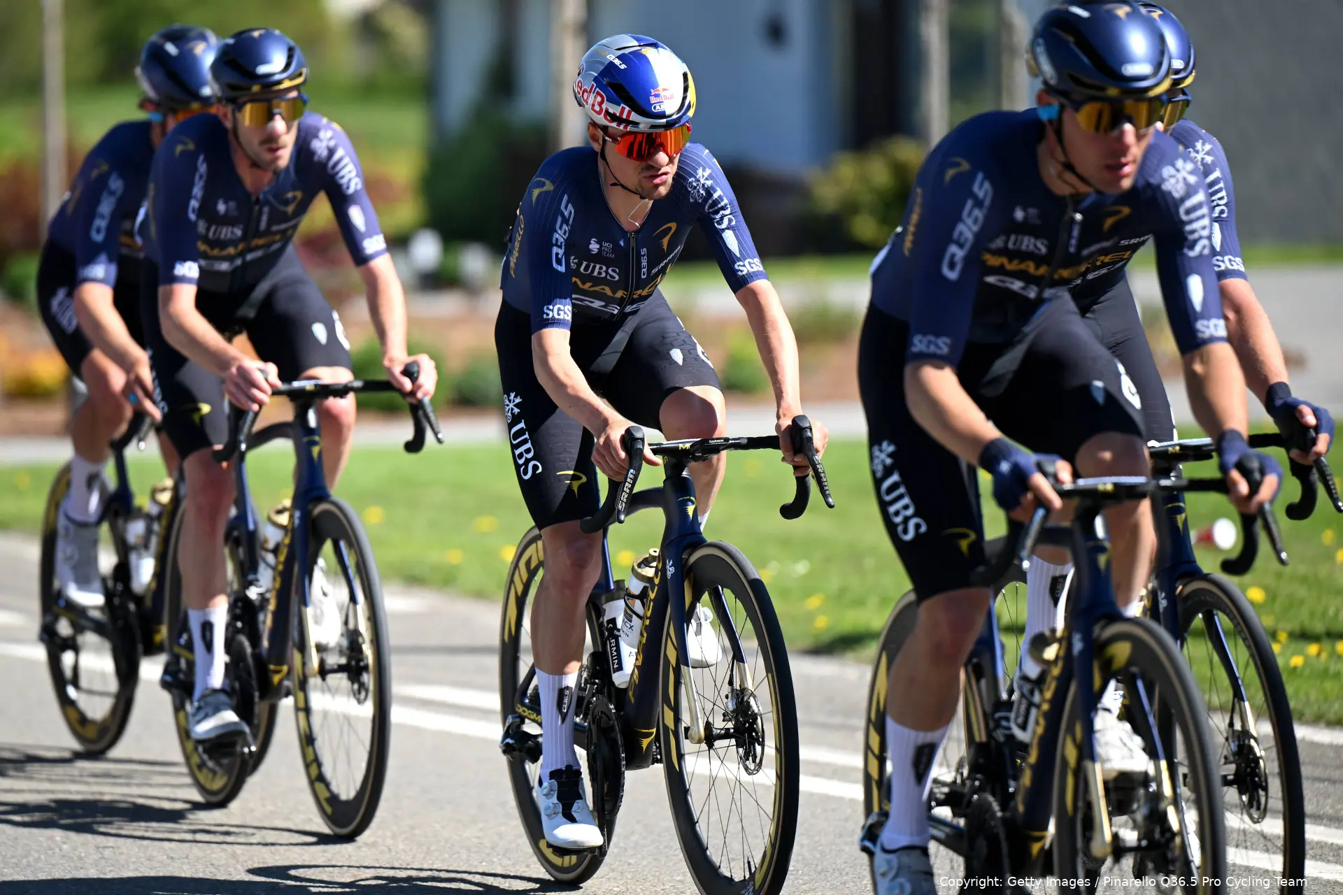 Tom Pidcock surrounded by Q36.5 teammates at Liege-Bastogne-Liege 2026